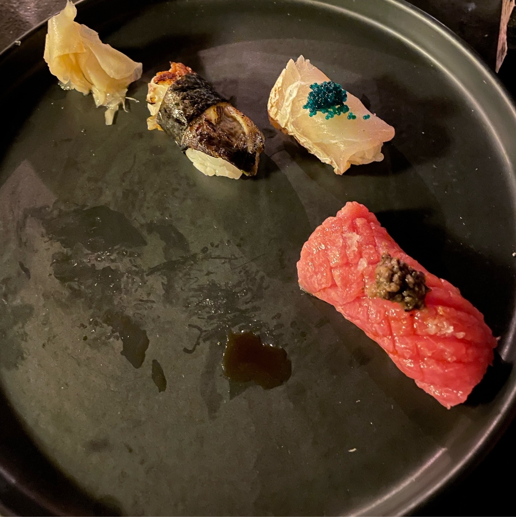 Although it's missing two pieces, there are three remaining pieces of nigiri.