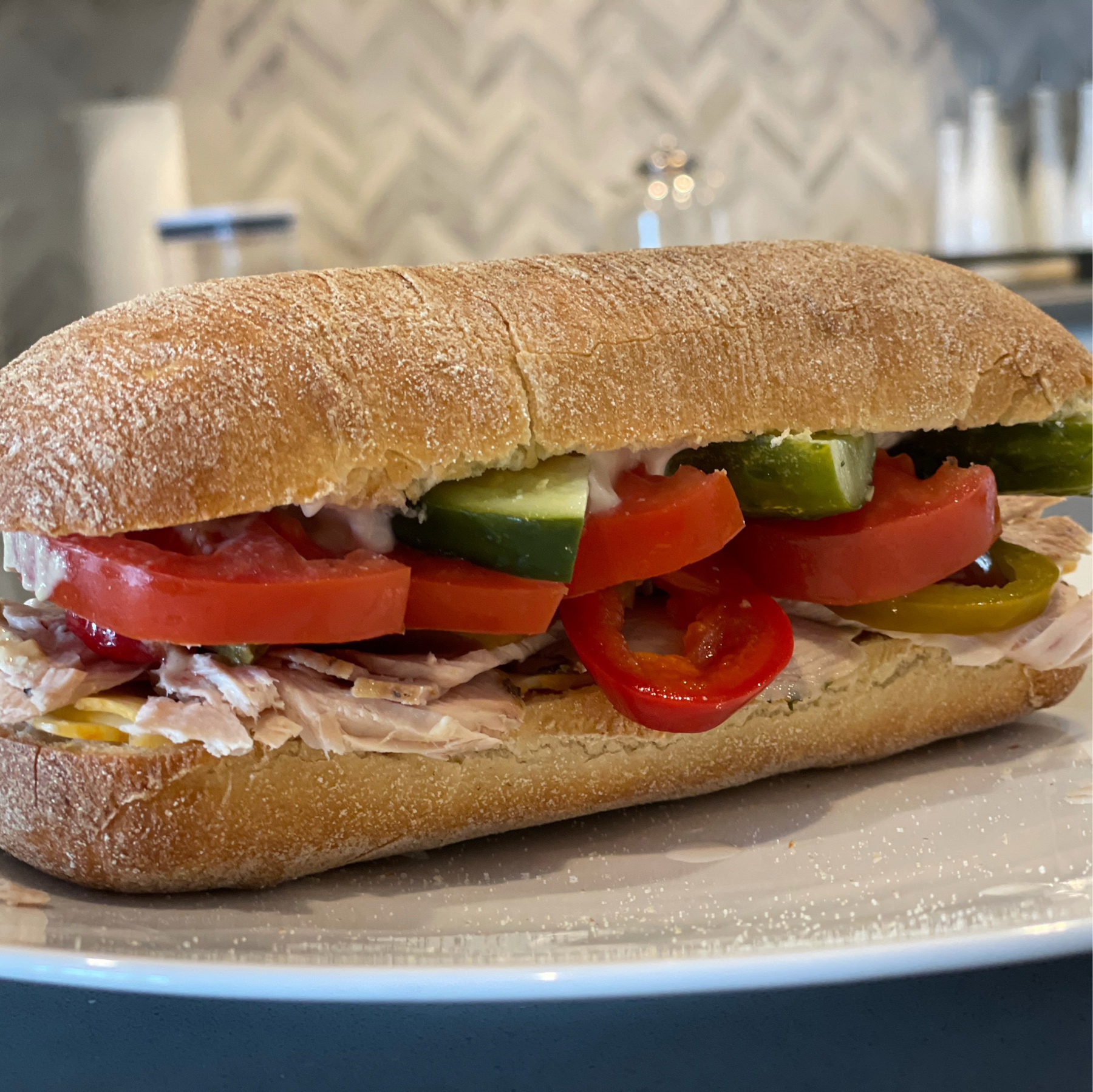 Fresh turkey sandwich on a ciabatta roll.