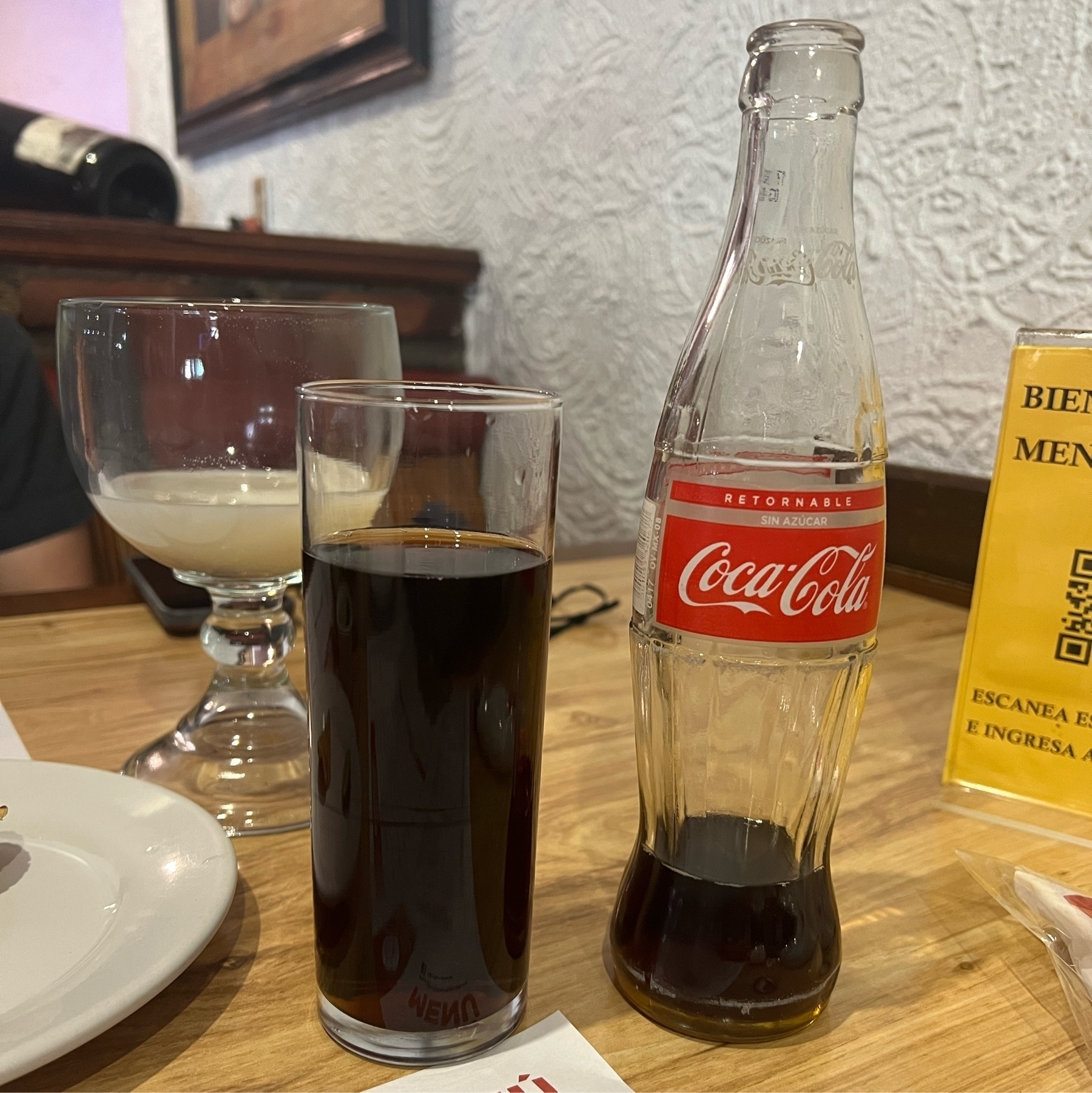 Horchata in the background; glass of Coke Zero in the foreground.